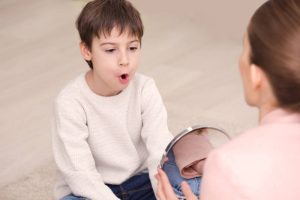Child receiving speech therapy